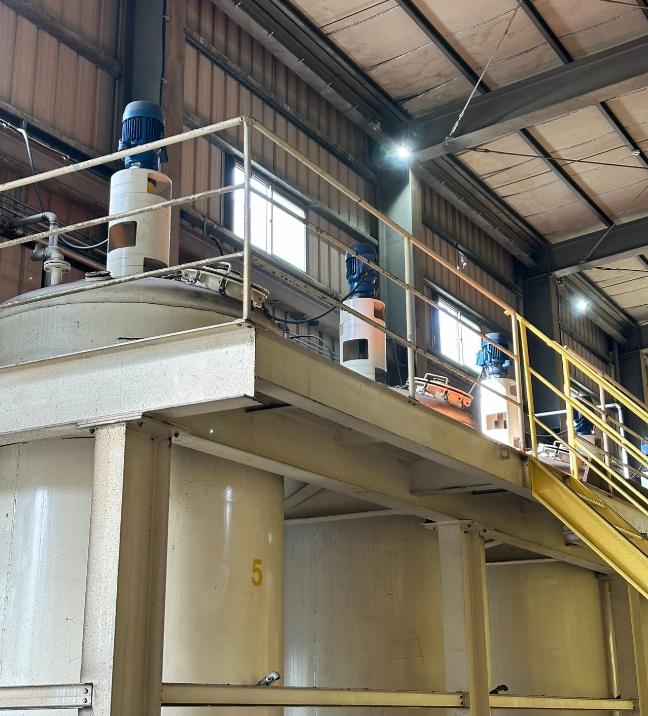 Agitated process tanks on the upper platform at CFI